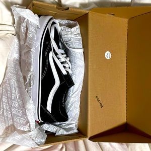 Never worn, in box, black and white vans! it was a gift and they didn't fit!